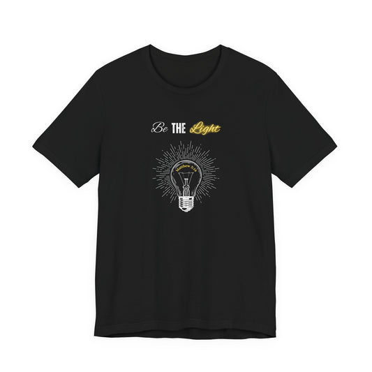 Be The Light Tee — Inspirational Lightbulb Graphic T-Shirt