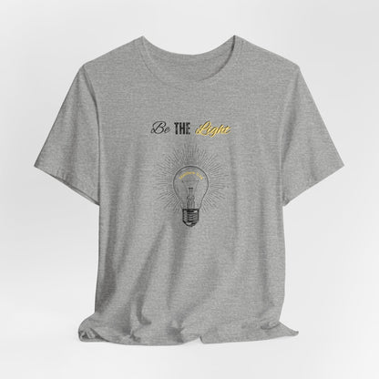 Be The Light Tee — Inspirational Lightbulb Graphic T-Shirt