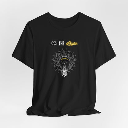 Be The Light Tee — Inspirational Lightbulb Graphic T-Shirt