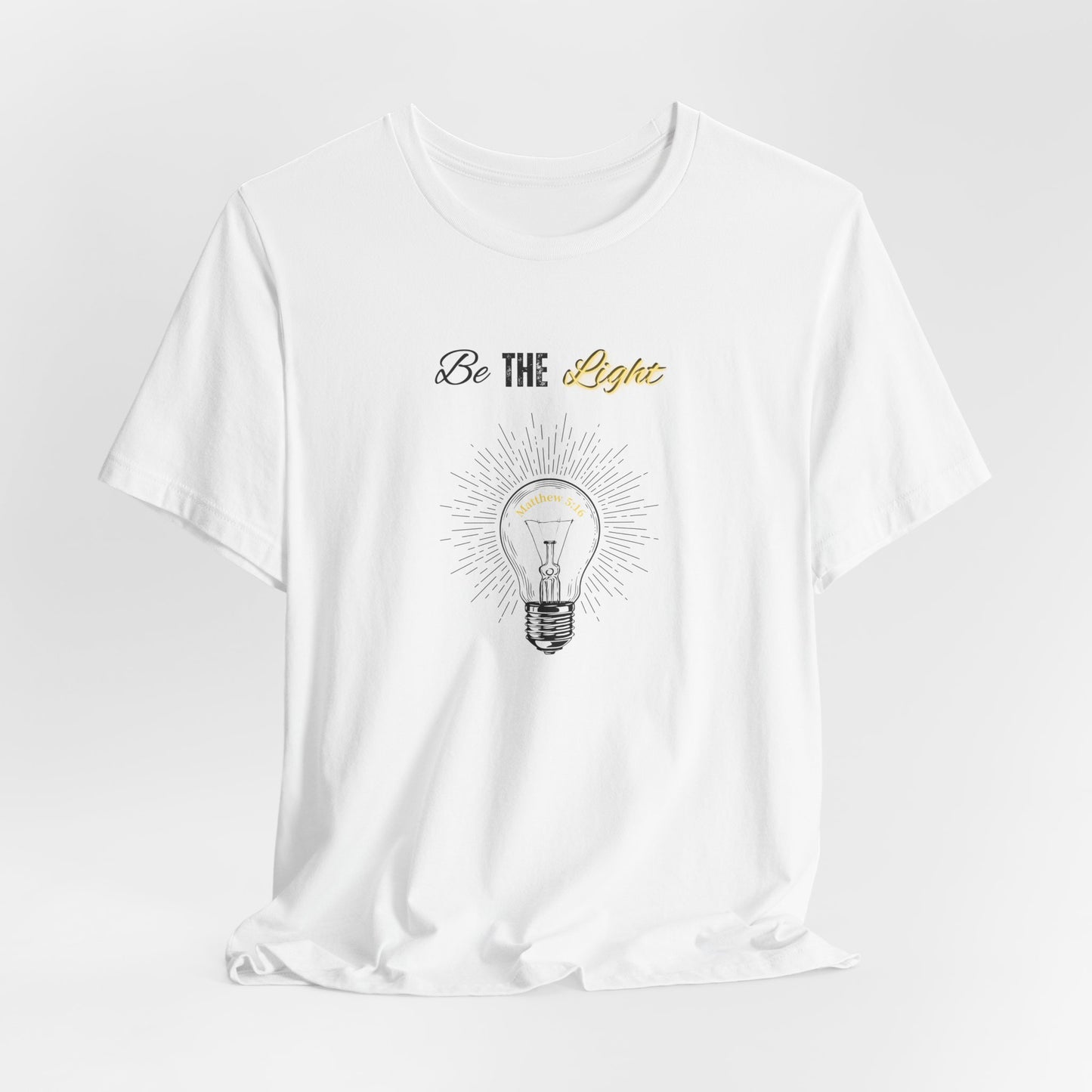 Be The Light Tee — Inspirational Lightbulb Graphic T-Shirt